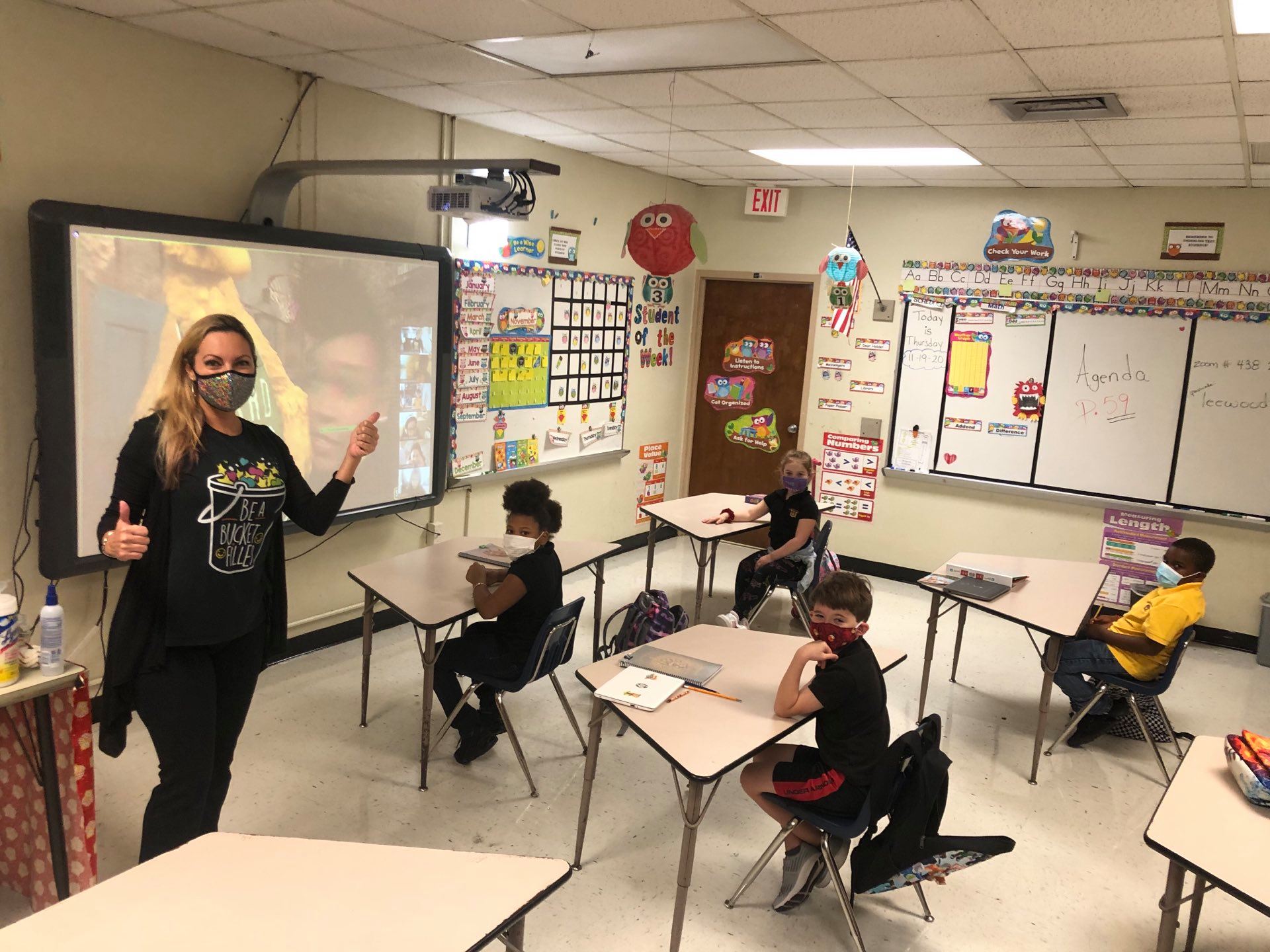 Teacher in Miami-Dade working with students during COVID-19 pandemic