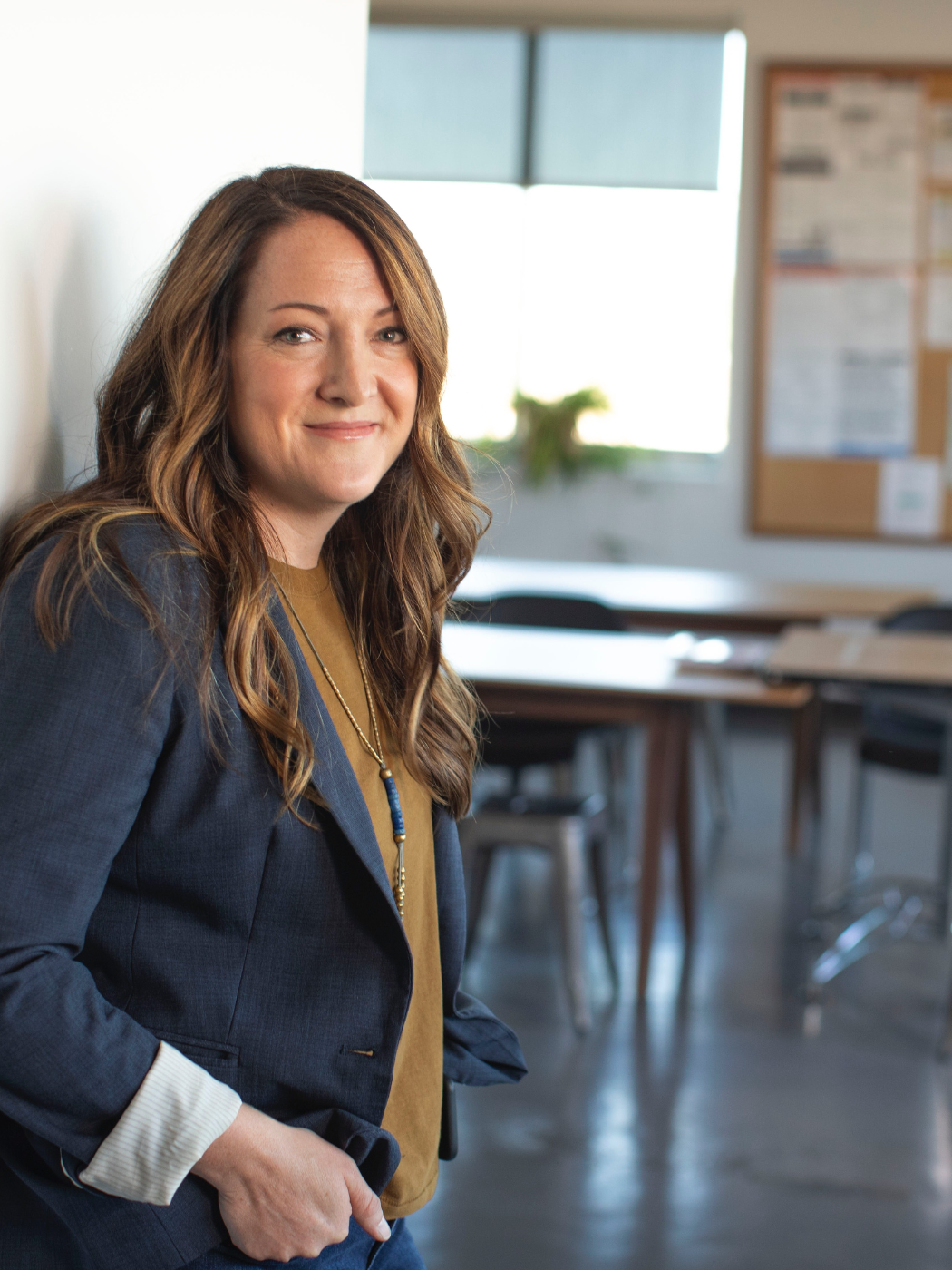 Teacher in her classroom, preparing for the day