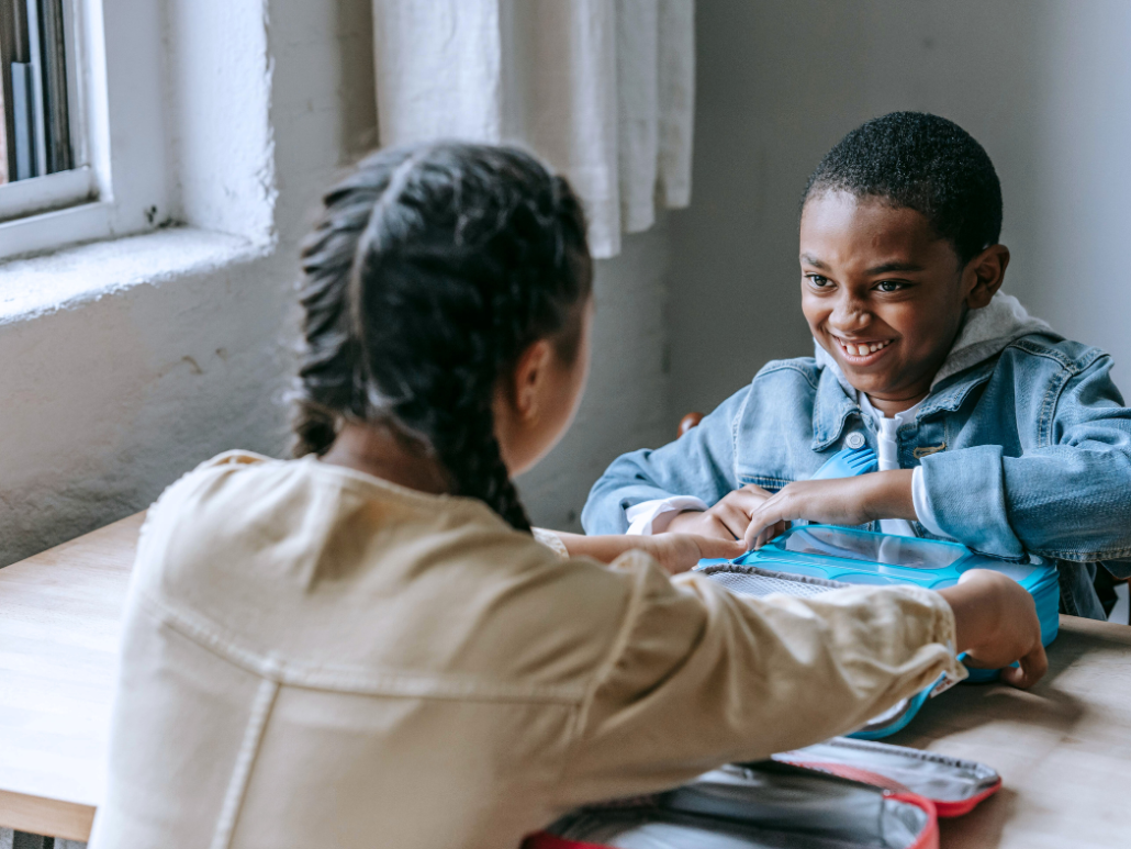 Two kids enjoying the classroom activity