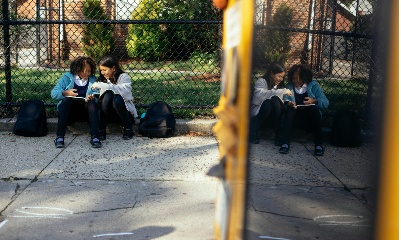 Students working outside of the school building